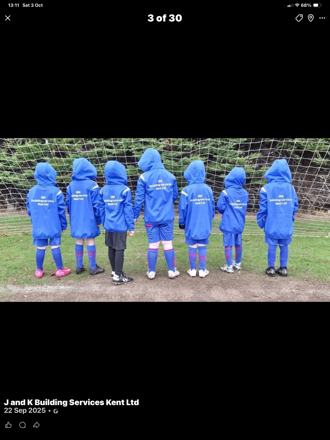 Park Regis JFC U8 Reds — J & K branding on the winter coats