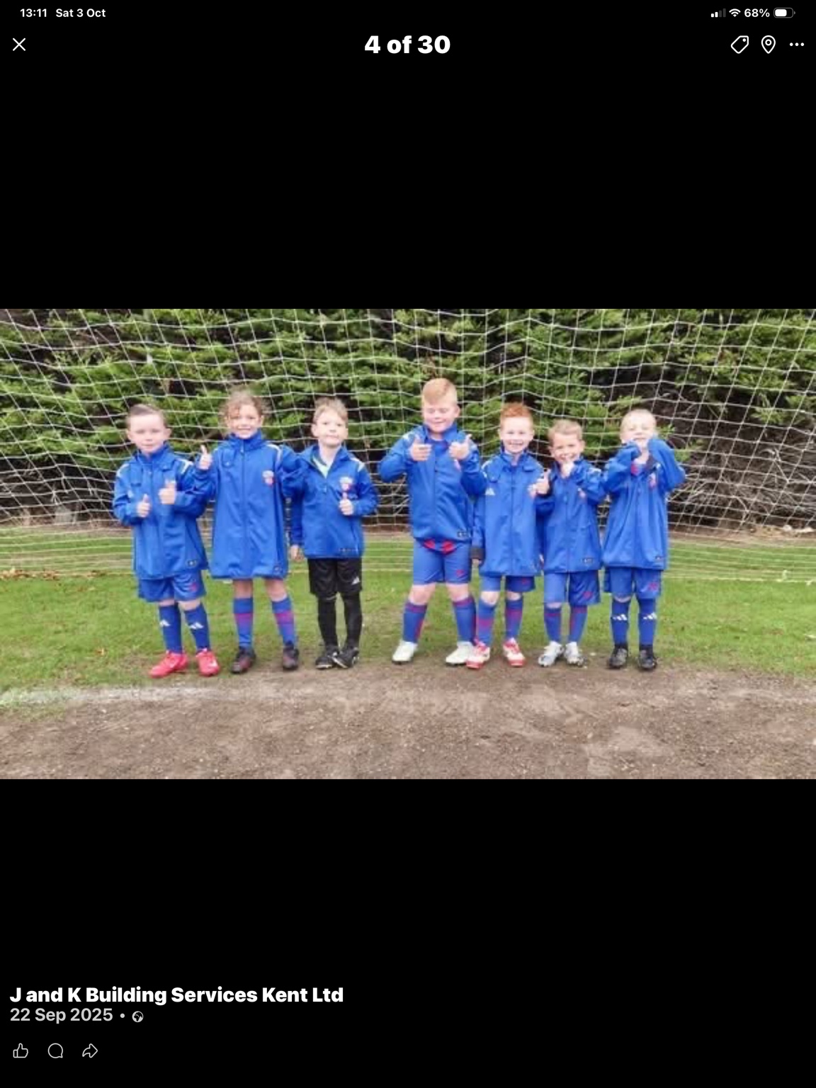Park Regis JFC U8 Reds — The team in their sponsored winter coats